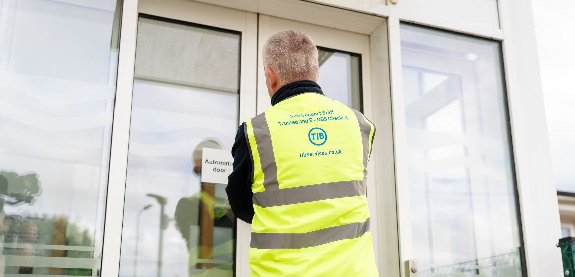 TIB operative unlocking the doors at a school