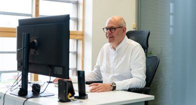 A TIB Vetting & Safeguarding Specialist interviews a candidate via a video call